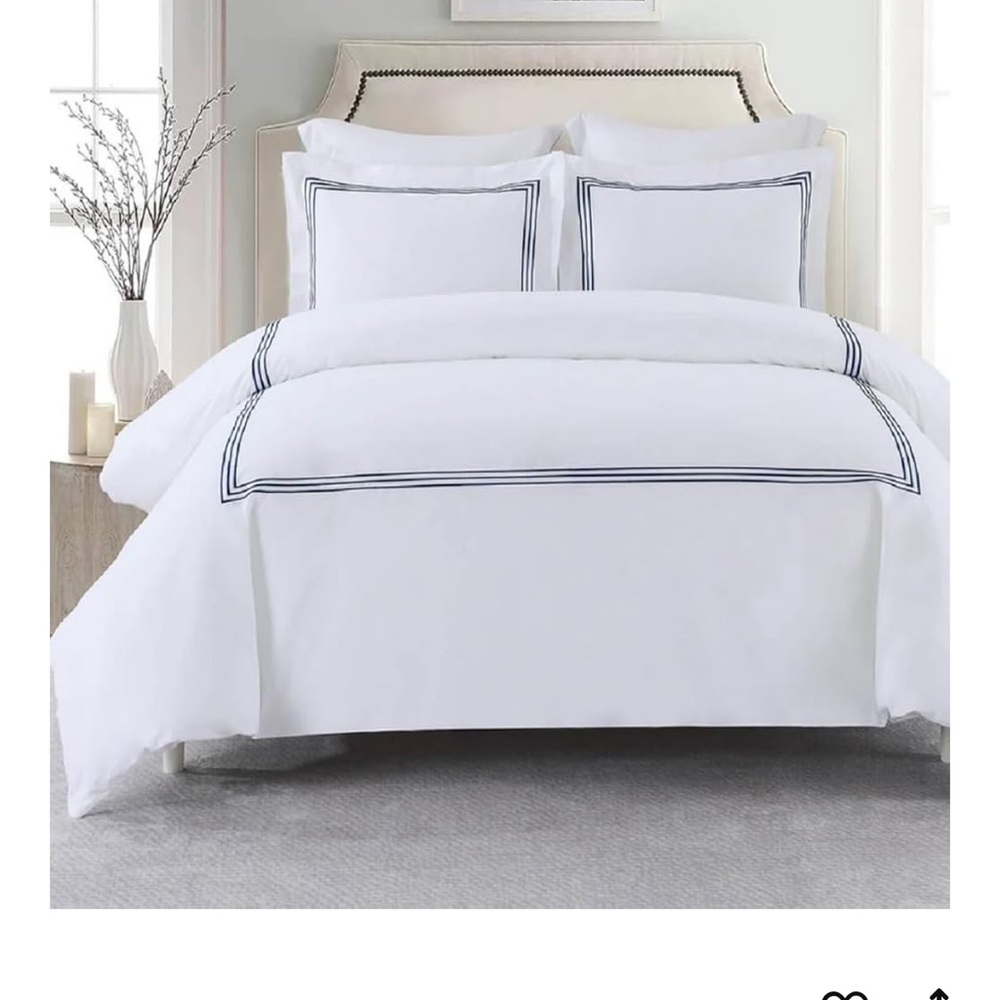 Elegant White Bedding Set with Navy Accents